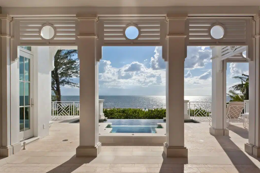 A private wellness suite: a lap pool under a timber ceiling